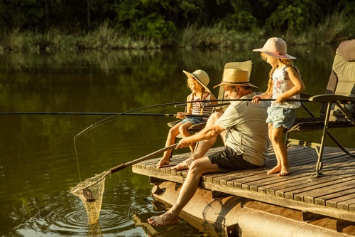 Family fishing activities were cited by travel writers as a part of the nostalgia travel phenomenon. Photo © Volodymyr Melnyk | Dreamstime.com